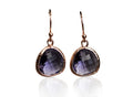 Pair of purple teardrop earrings with rose gold frames on a white background