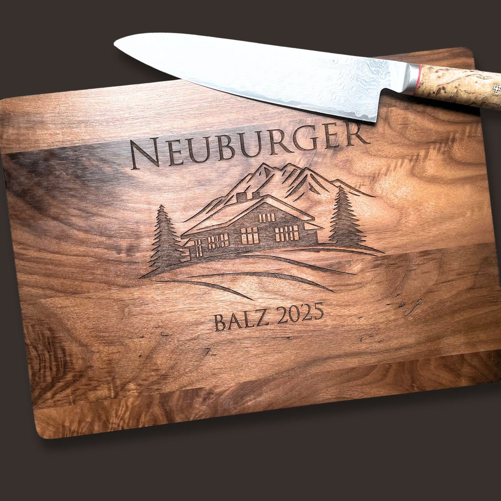 Walnut cutting board with engraved mountain home design