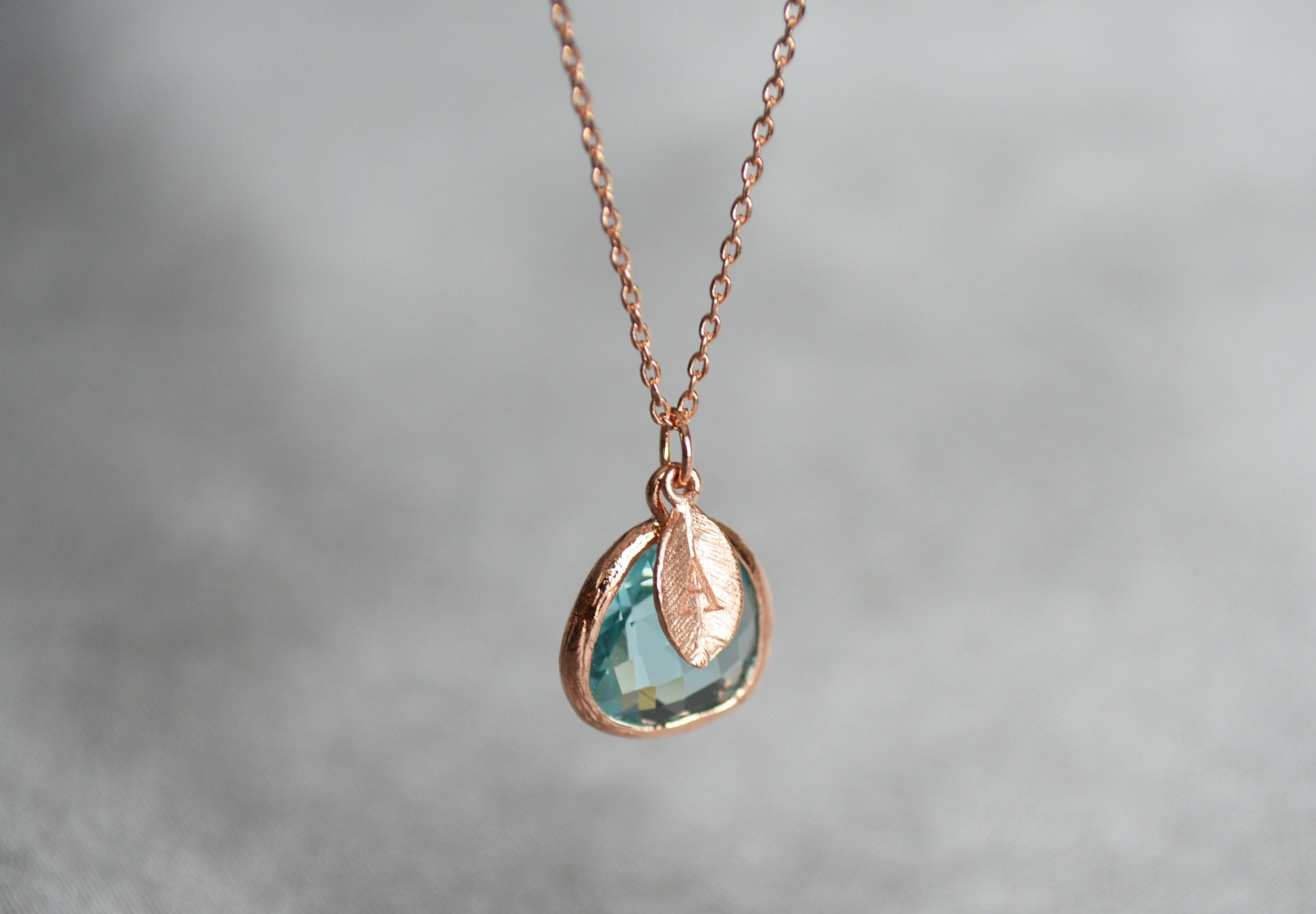 initial stamped on leaf charm necklace