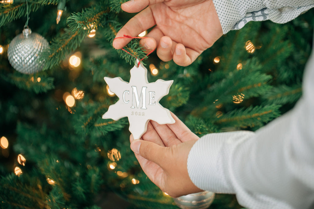 snowflake shaped holiday ornament with monogram