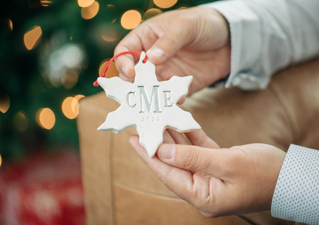 small snowflake holiday ornament with personalized year and monogram